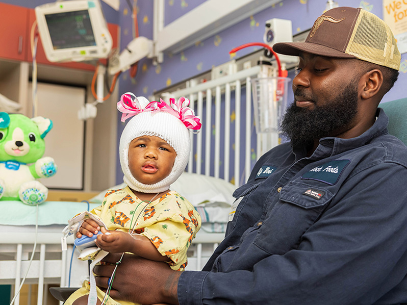 Doctors at the Morris Center for Cleft and Craniofacial Research and Innovation at Children's of Mississippi give their patients child-friendly head wraps after surgery. Shown is patient Taylor Dudley of Ridgeland.